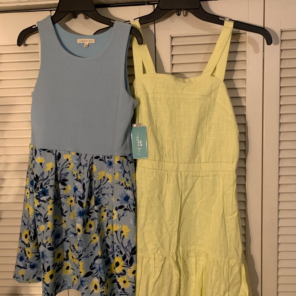 Stylish Kids Dresses in Blue Floral and Yellow.   Both dresses for 31